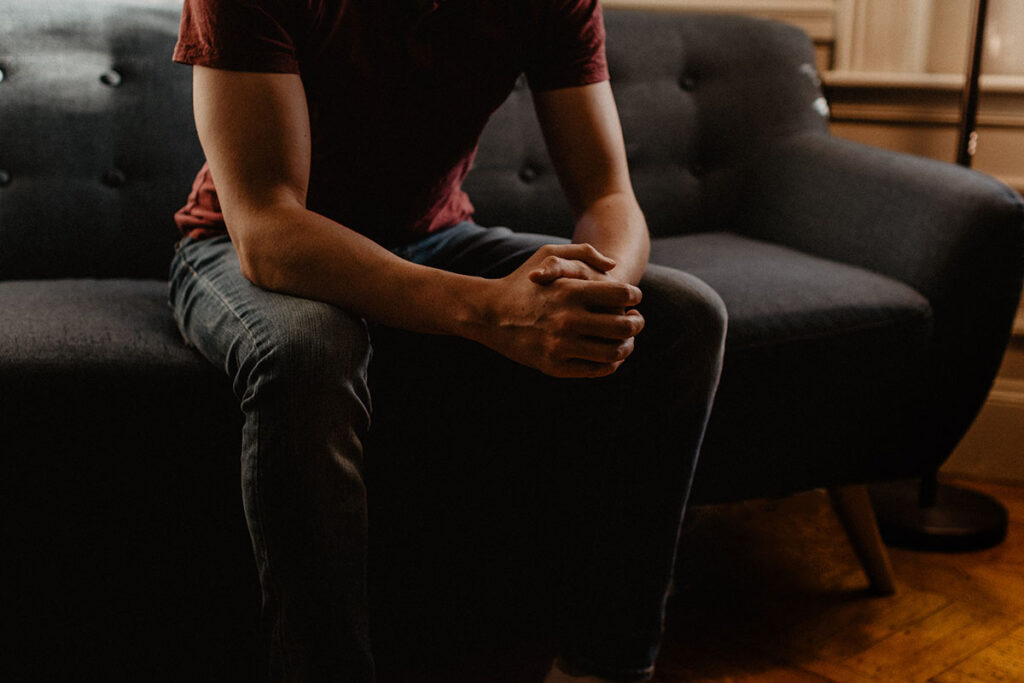 A person sitting on the couch