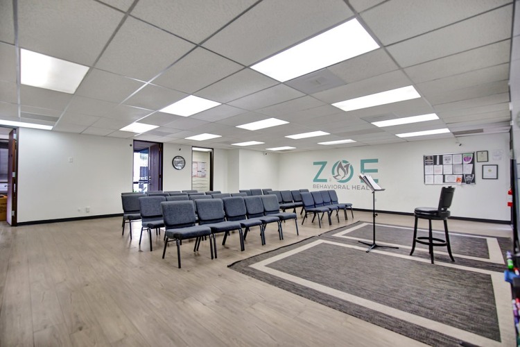 Zoe Behavioral Health room, furnished with chairs, offers a space for conversation.