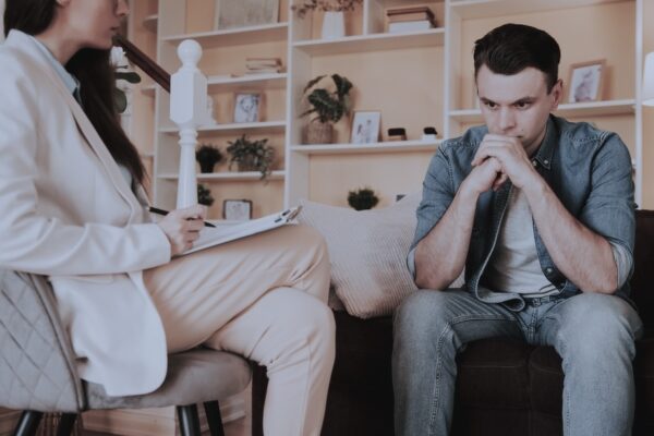 Man consulting with a therapist for fentanyl addiction treatment