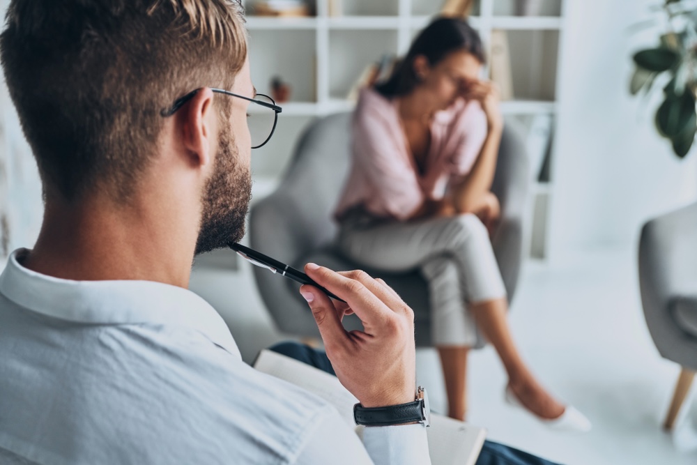 Therapist having a session with her female patient