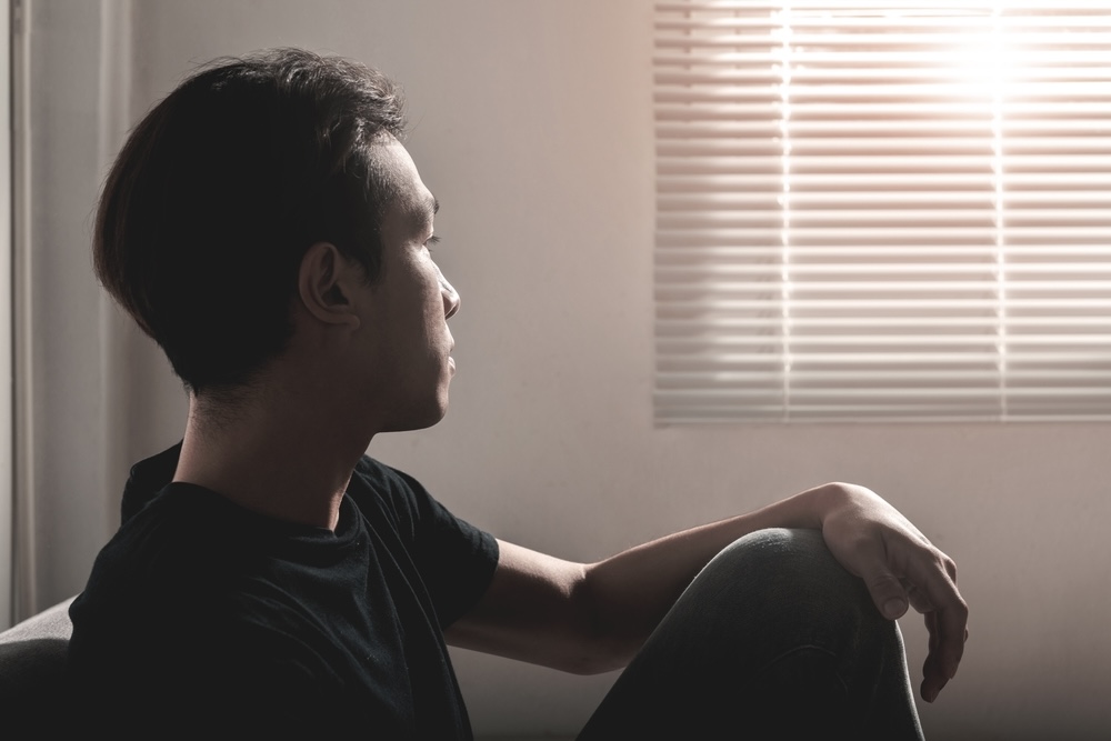Man in drug and alcohol recovery try to stay sober while dealing with cravings